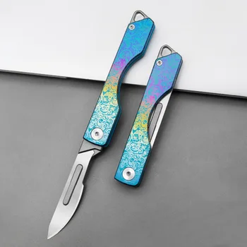 színes titánötvözet összecsukható kés helyettesítheti a pengéket szike kültéri túlélés kemping EDC szerszám kulcstartó zsebkés ajándék
